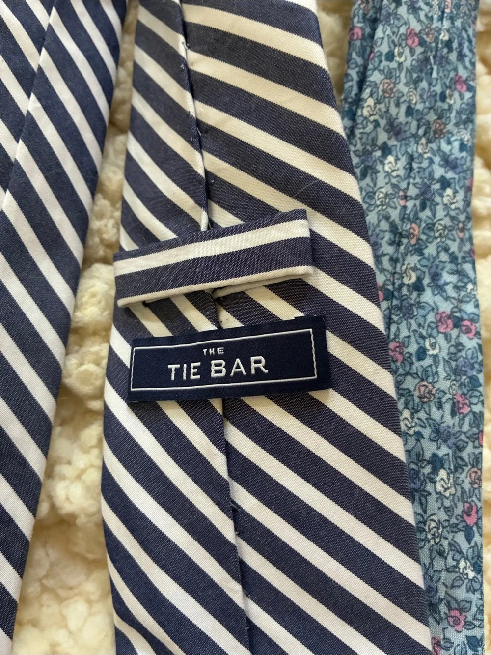 The Tie Bar Navy Stripe, Blue Floral, and Pink Plaid Neckties